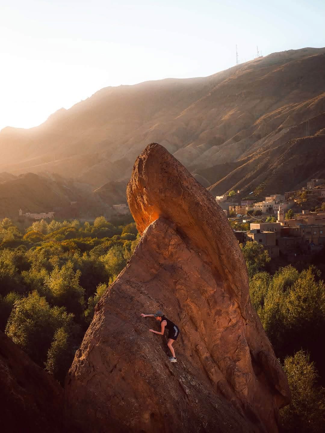 Climber on the Monkey Fingers rocks above the Dades Valley